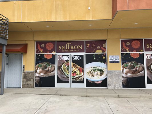 Restaurant storefront with printed window graphics